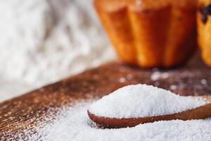 muffins baked with the addition of ammonium carbonate on a wooden rustic background photo