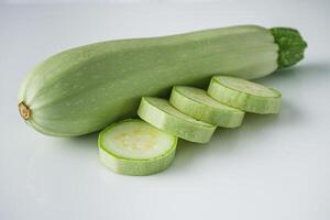 fresh natural zucchini on a white background photo