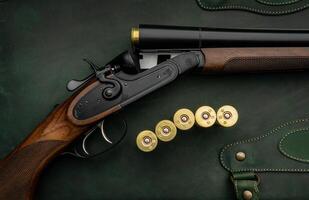 Classic trigger double-barreled hunting rifle on a green background. Smooth-bore hunting rifle open for reloading. Concept postcards for hunters. photo