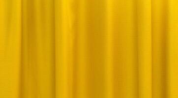 Fabric yellow curtains. Abstract background, curtain, drapes gold fabric. Crumpled cloth, folds of fabric. photo