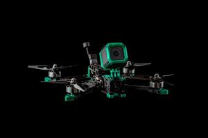 Modern FPV drone. Four-engine aircraft on the radio control. Drone for racing, filming and entertainment. Dark back. photo