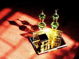 Small model of the Kaaba, the holy mosque of the Grand Mosque, Mecca, isolated on a dark background. There is sunlight coming performing an amazing shadow and shining reflection photo
