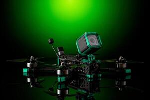 Modern FPV drone. Four-engine aircraft on the radio control. Drone for racing, filming and entertainment. photo
