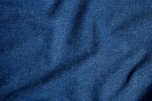Blue denim texture. Closeup of denim jacket elements. Background for banner, poster or adrift. photo