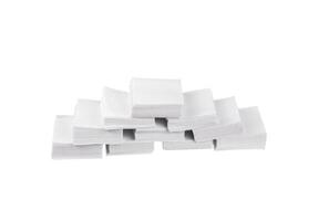 Patches for cleaning weapons isolate on a white back. White square scraps of fabric folded in a pile. photo