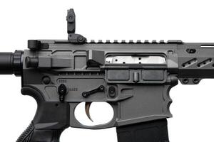 Close-up of a modern automatic carbine with mechanical sights. Weapons for sports and self-defense. Armament of special forces and the army. Isolate on a white back. photo