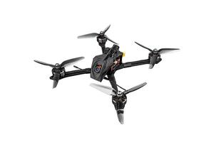 Modern FPV drone on a white background. Four-engine aircraft on the radio control. Drone for racing, filming and entertainment. photo
