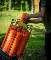 Traps machine for shooting-ground training. Automatic machine machine for launching clay pigeons. photo