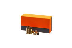 Box of cartridges for a traumatic gun isolate on a white background. Cartridges with rubber bullets for a traumatic gun. photo