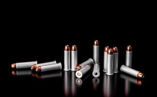 Bullet isolated on black background with reflexion. Rifle bullets close-up on black back. Cartridges for rifle and carbine on a black. photo