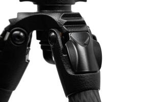Modern carbon tripod. Lightweight portable stand for photo or camera. Tripod for spyglasses and telescopes. Isolate on a white back.