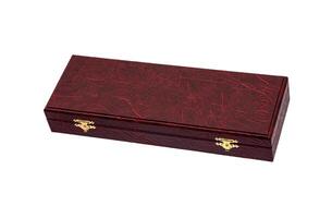 Red case with gilded locks. Box for an expensive gift. Luxury packaging isolate on a white background. photo