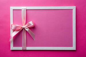 White ribbon tape with a rectangle with pink background for your presentation background photo
