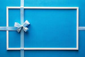 White ribbon tape with a rectangle with blue background for your presentation background photo