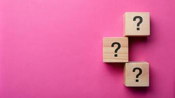 Pink background with question wood mark for your presentation background photo