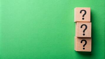 Green background with question wood mark for your presentation background photo