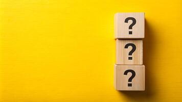 Yellow background with question wood mark for your presentation background photo