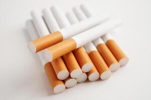 Cigarette, roll tobacco in paper with filter tube, No smoking concept. photo