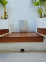 An empty decorative flower vase in one of the coffee shop areas photo