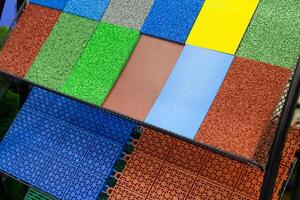 Samples of various multi-colored artificial turf for sports fields photo