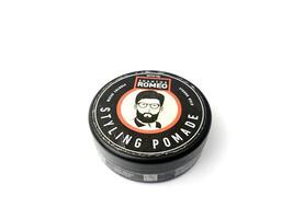 a can of romeo styling pomade on a white surface. Indonesia, Sibolga, 10 August 2024. photo