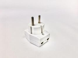 electric plugs at three intersections on a white background. photo