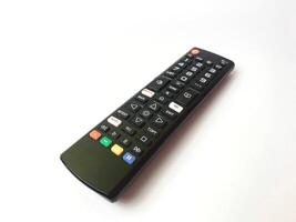 a tv remote on a white background. photo