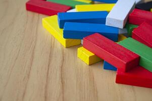 Multicolored wooden blocks with customizable space for text or ideas. Toys and copy space concept. photo