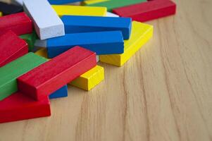 Multicolored wooden blocks with customizable space for text or ideas. Toys and copy space concept photo