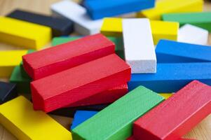 Multicolored wooden blocks with customizable space for text or ideas. photo