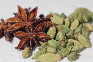 Dry organic Cardamom or Elakka top view background or texture. Healthy spices, nuts, seeds and herbal products. photo