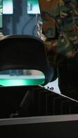 Vertical Army soldiers packing weapons able to engage targets at extended range with accurate, lethal fire. Military units loading guns with bullets, preparing for enemy suppression mission, camera A video