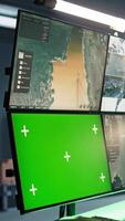Vertical Soldier in military HQ base using green screen equipment to gather information on enemy troops. Officer using chroma key devices to do assessment of enemy vulnerabilities, camera B video