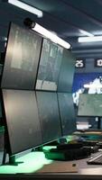 Vertical High tech room in army governmental establishment used for surveillance monitoring. Panning shot of empty military base of operations with radar systems, tracking enemy units video