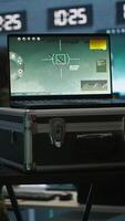 Vertical Military officer using tracking software on laptop to gain info helpful against enemies. Army professional using notebook to gain intel helping troops, coordinating mission activities, camera A video