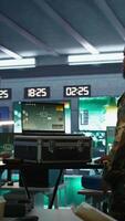 Vertical Military officer using tracking software on laptop to gain info helpful against enemies. Army professional using notebook to gain intel helping troops, coordinating mission activities, camera B video