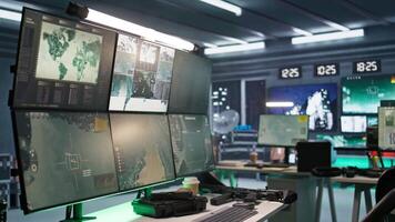 Secure room in army governmental facility used for surveillance monitoring. Empty military base of operations with radar systems, tracking enemy aircraft entering airspace video