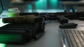 Extreme close up of weapons in empty army command center housing operational defense systems. Guns on table in armed forces headquarters used for tracking rockets using radar systems video