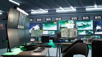 High tech room in army governmental establishment used for surveillance monitoring. Panning shot of empty military base of operations with radar systems, tracking enemy units video