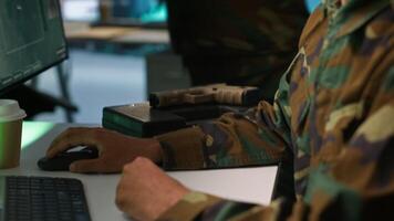 Army telecommunication systems operator using radio and satellite gear to gather intel, providing combat support. Special forces military dispatcher managing communications networks, camera A video