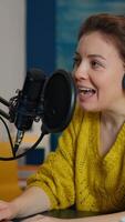 Vertical . Famous blogger in home studio broadcasting using modern technology. Creative online show on-air production internet broadcast host streaming live content, recording digital social media communication video