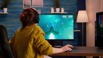 Professional gamer playing and winning in space shooter online game on powerful computer. Pro esports player streaming cyber performing gaming tournament in cyberspace using network wireless video