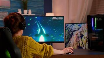 Online streaming cyber performing on powerful personal computer during gaming tournament, esports player using technology network wirelessfor virtual shooter game in cyberspace, video
