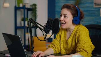 Famous blogger in home studio broadcasting using modern technology. Creative online show on-air production internet broadcast host streaming live content, recording digital social media communication video