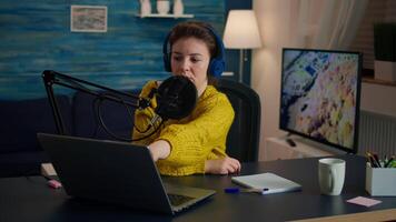 Vlogger on air during online show using laptop, reading emails. Creative online show On-air production internet broadcast host streaming live content, recording digital social media communication video