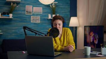 Blogger speaking with followers on live podcast using headphones. Creative online show On-air production internet broadcast host streaming live content, recording digital social media communication video