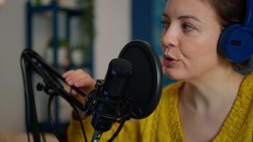 Entertainment blogger broadcasting from home studio new show in the night. On-air online production internet broadcast show host streaming live content, recording digital social media communication video
