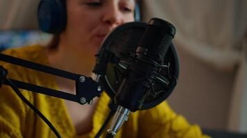Creative show vlogger presenter recording sound in home studio for podcast. On-air online production internet broadcast show host streaming live content for digital social media using internet web video