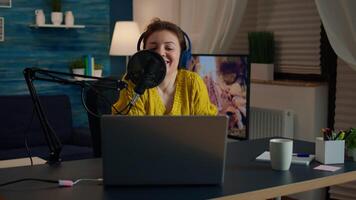 Influencer wearing headphones recording new podcast series for audience. On-air online production internet broadcast show host streaming live content for digital social media using internet web video