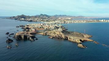 Aerial view of Cabo de Palos lighthouse near Mar Menor Spain video